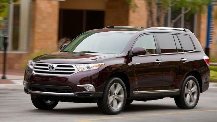 2013 Toyota Highlander in maroon.