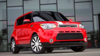 2014 Kia Soul in red.