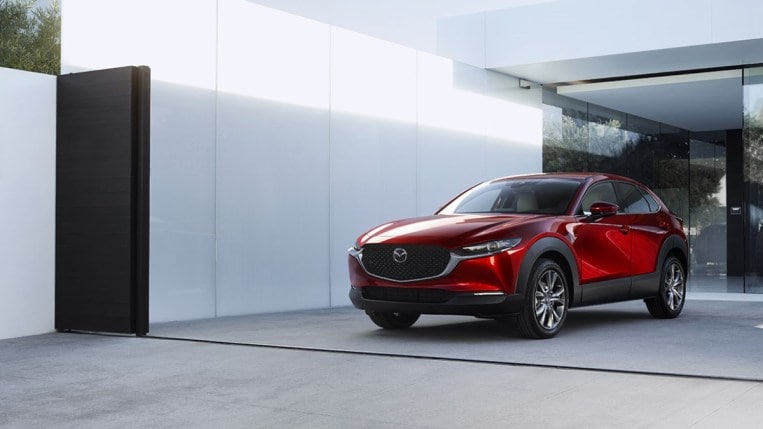 The 2020 Mazda CX-30 in red from a front quarter angle