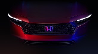A teaser image showing the grille of the 2023 Honda Accord