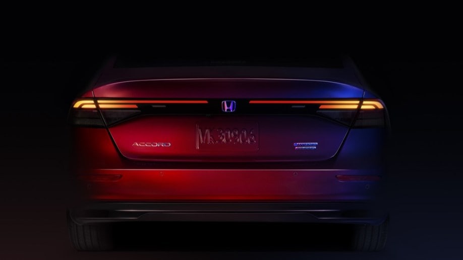 A teaser image showing the rear of the 2023 Honda Accord