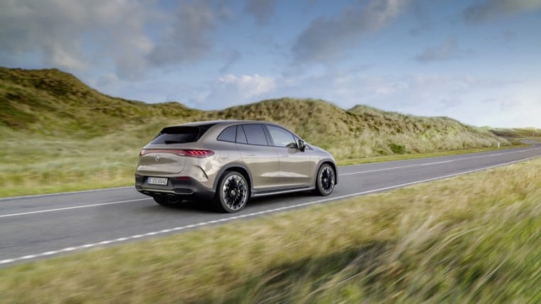 The 2023 Mercedes-Benz EQE SUV from a rear quarter angle