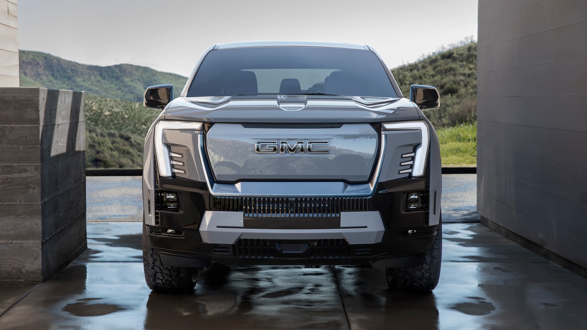 Silver 2024 GMC Sierra EV Denali Edition front closeup.