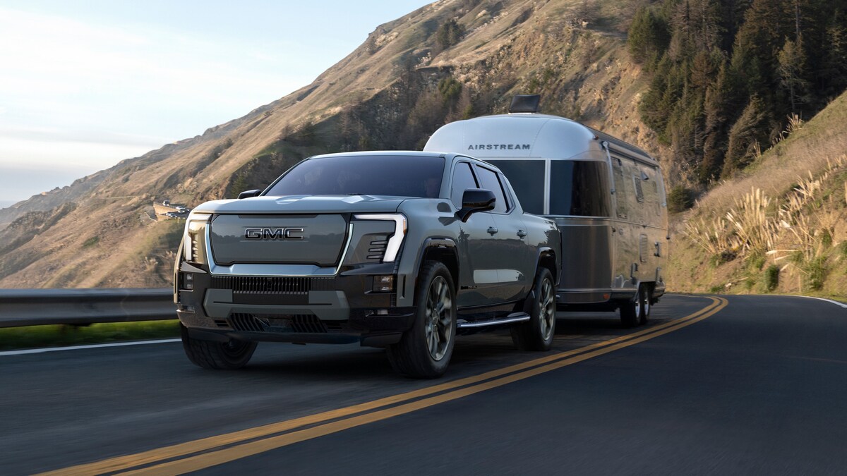 2024 GMC Sierra EV Denali Edition towing trailer.