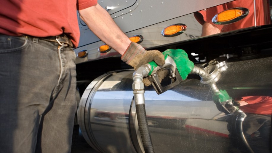 refueling at a gas pump with diesel