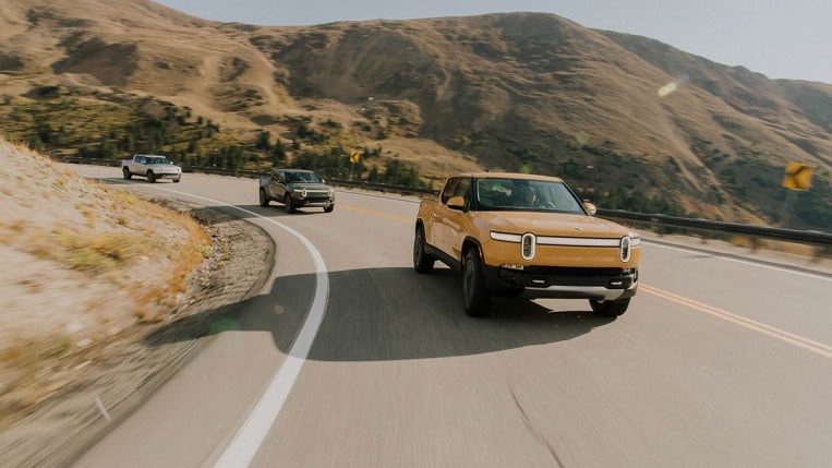 2022 Rivian R1T on mountain highway.