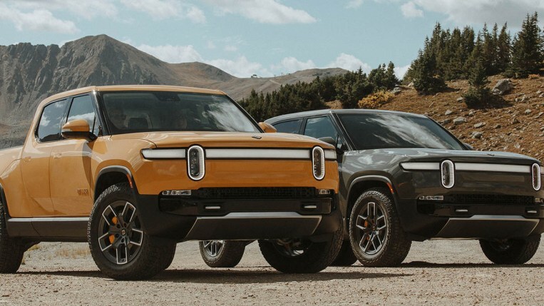 Two 2022 Rivian R1Ts parked in mountains