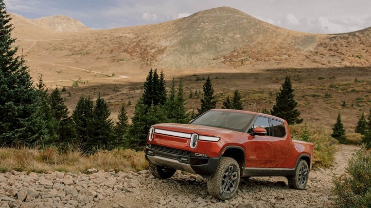 2022 Rivian R1T on rocky terrain.