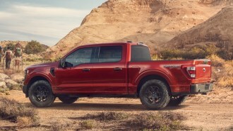 Red 2023 Ford F-150 Rattler on desert road