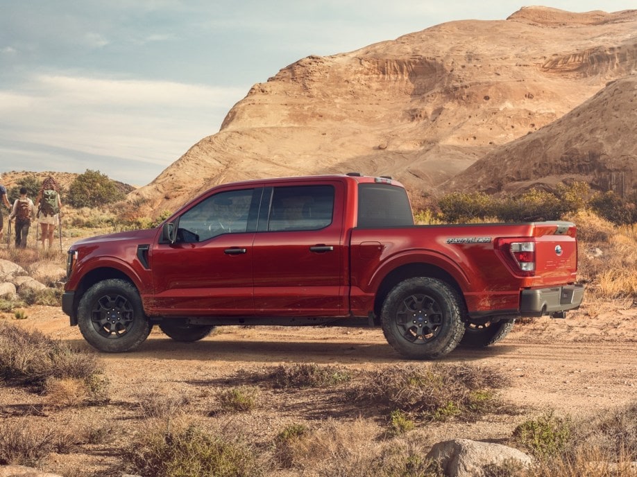 Red 2023 Ford F-150 Rattler on desert road