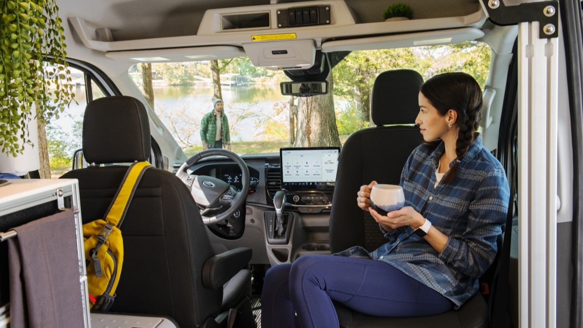 The interior of the 2023 Ford Transit Trail with its swivel seats