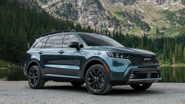 2023 Kia Sorento X-Line near a mountain and trees