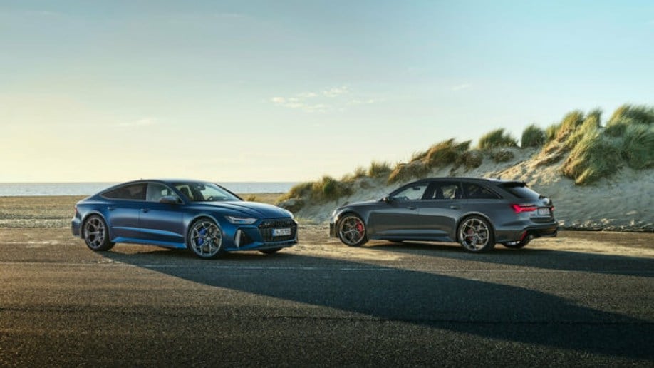 The 2024 Audi RS6 Avant and RS7 Performance models in profile, parked facing each other