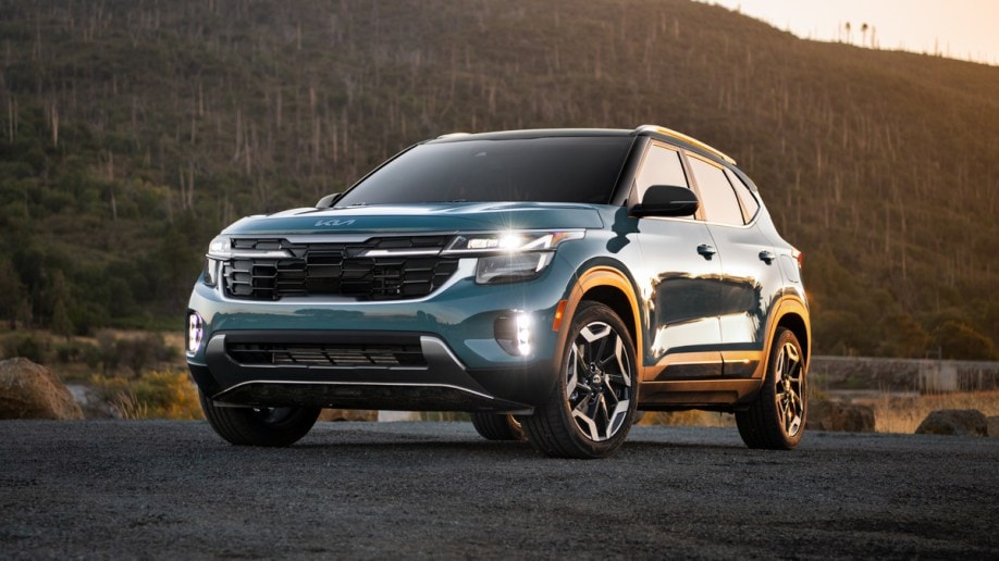 Blue 2024 Kia Seltos near forest