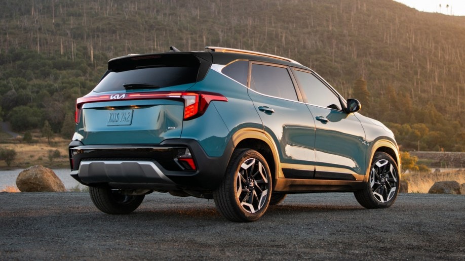 Blue 2024 Kia Seltos near forest