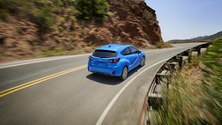 The 2024 Subaru Impreza seen from a rear quarter angle