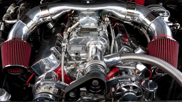 A hotrod engine with a supercharger and dual air intakes