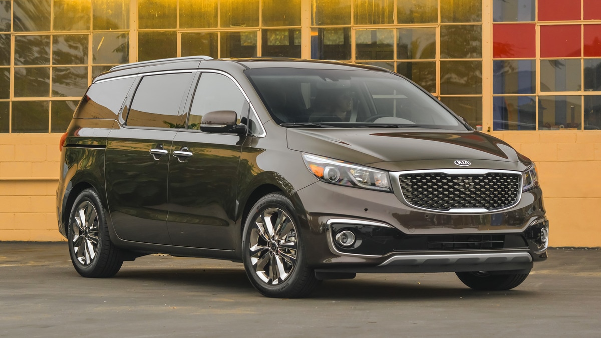 2017 Kia Sedona near small square windows.