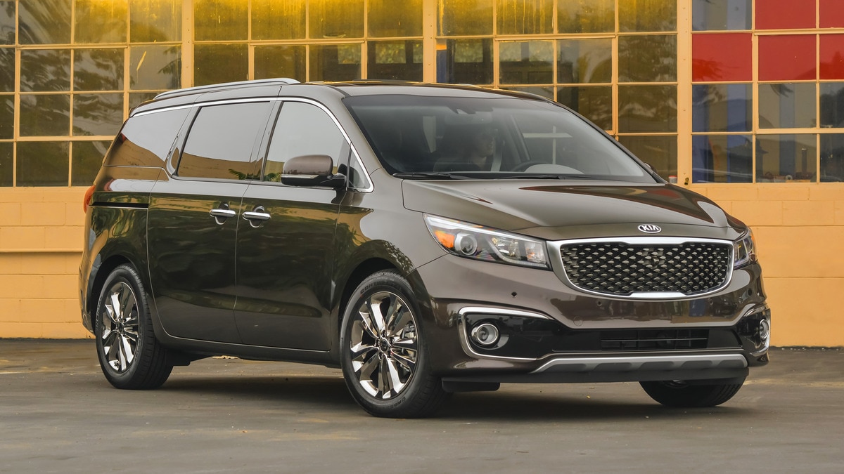 2017 Kia Sedona near small square windows.