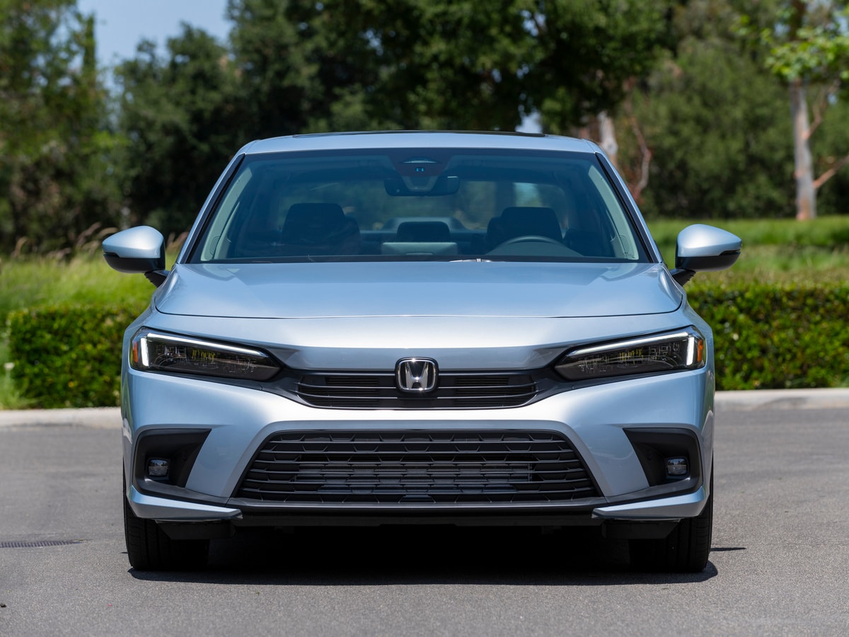 Silver 2022 Honda Civic Sedan near park