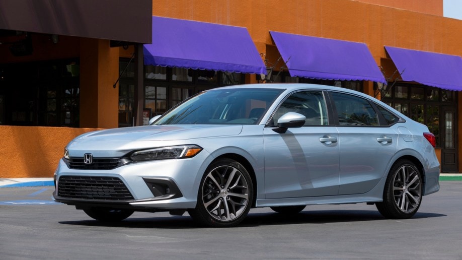 Silver 2022 Honda Civic Sedan near purple awnings