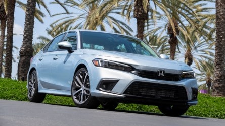 Silver 2022 Honda Civic Sedan near palm trees