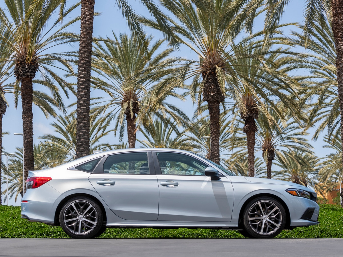 Silver 2022 Honda Civic Sedan near palm trees
