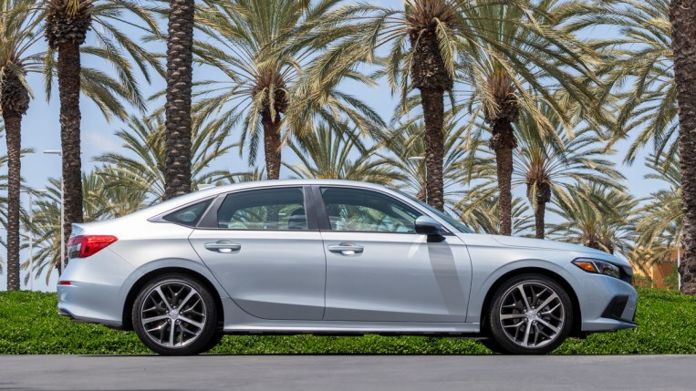 Silver 2022 Honda Civic Sedan near palm trees