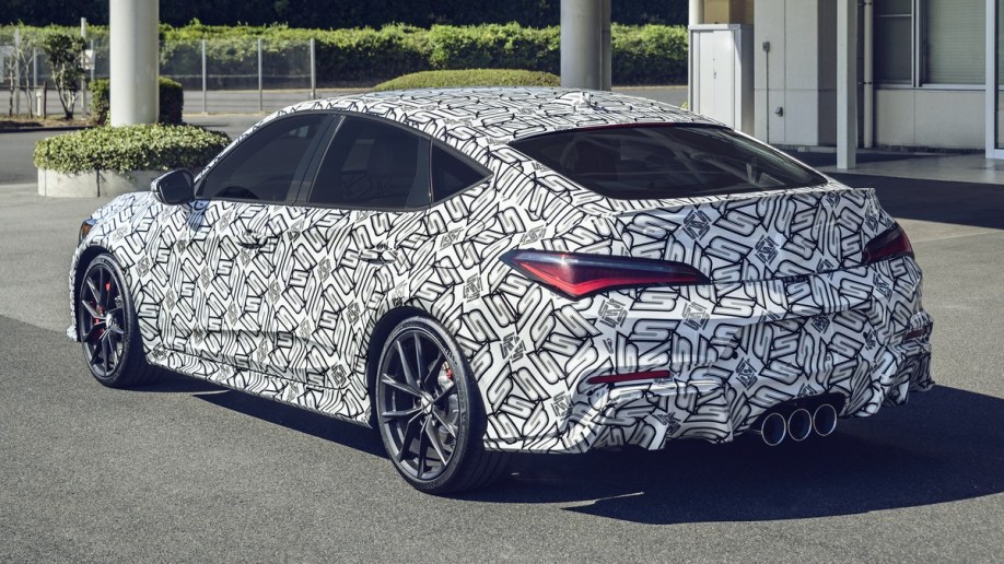 The 2024 Acura Integra Type S in testing from a rear quarter angle