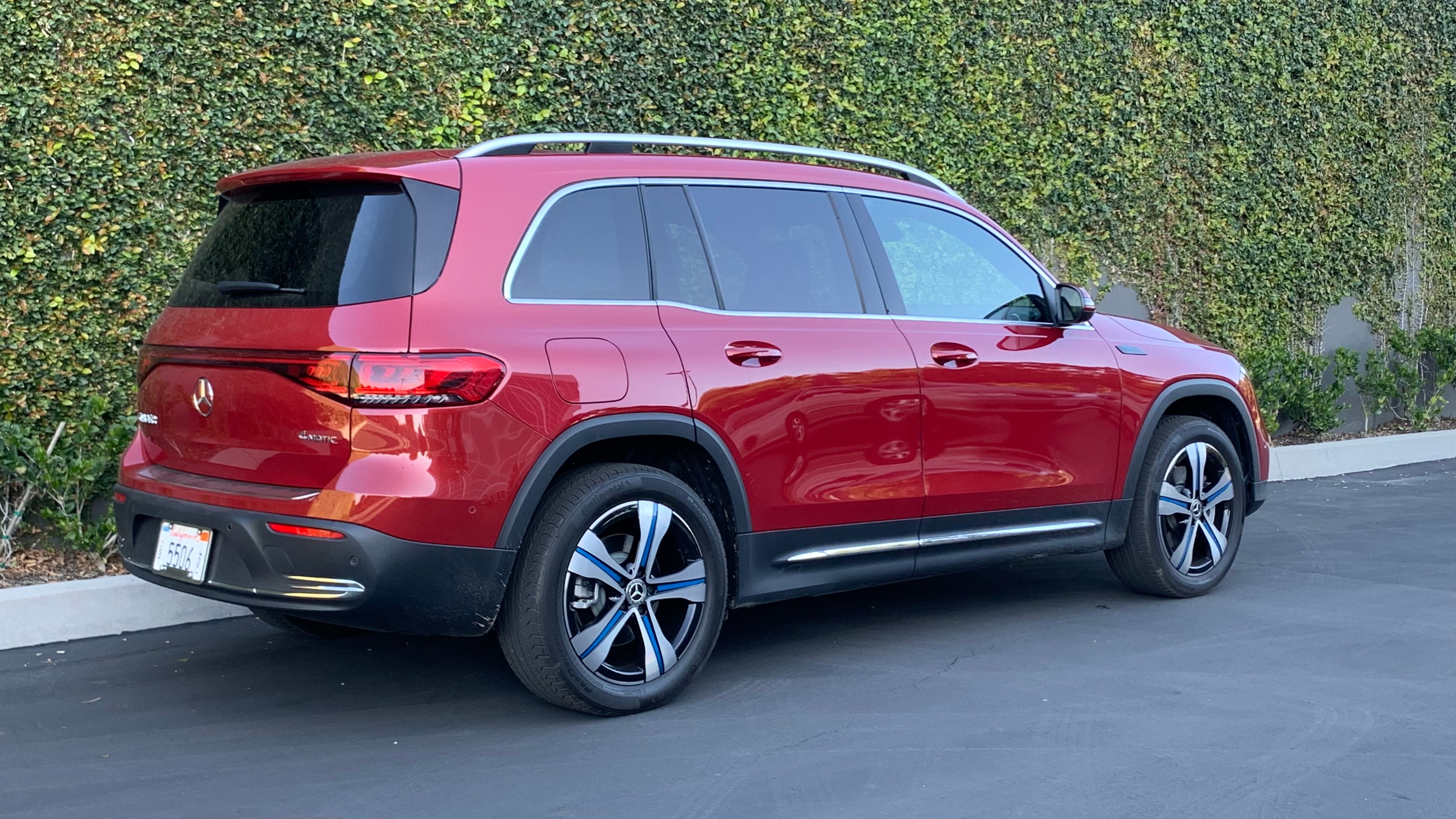 Mercedes-EQ EQB 350 in red, as seen from the rear