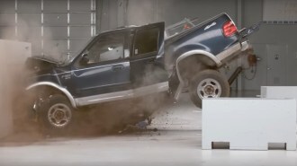 The Insurance Institute for Highway Safety performs a crash test on a Ford F-150 loaded with added weight to evaluate whether its own equipment can test heavier electric cars