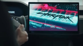 A Tesla driver plays Cyberpunk 2077 on their infotainment screen