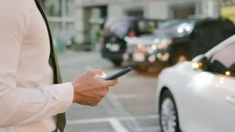 A phone user uses a digital code to unlock a car