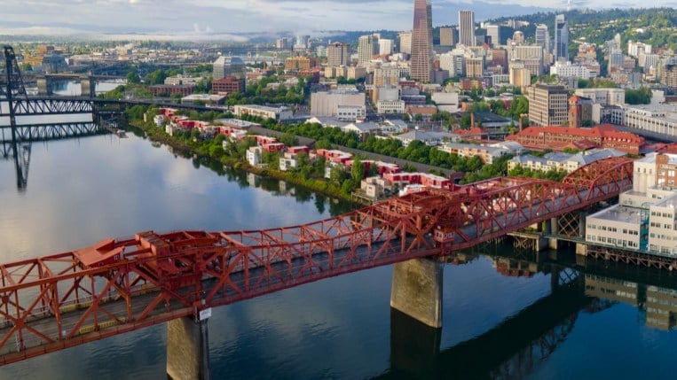 The city of Portland, Oregon seen from the air, with the Broadway bridge in the foreground.