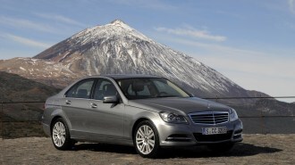 The 2011 Mercedes-Benz C-Class seen from a front quarter angle