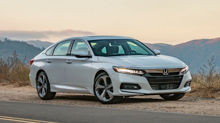 White 2018 Honda Accord with mountains in background.