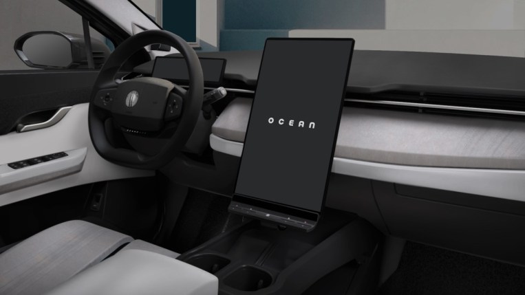 The interior of the 2023 Fisker Ocean, with its rotating central touchscreen