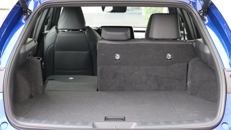2023 Lexus UX 250h F Sport rear cargo with seat folded.