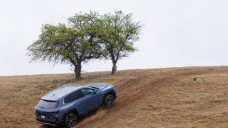 The 2023 Mazda CX-50 seen from overhead on a trail