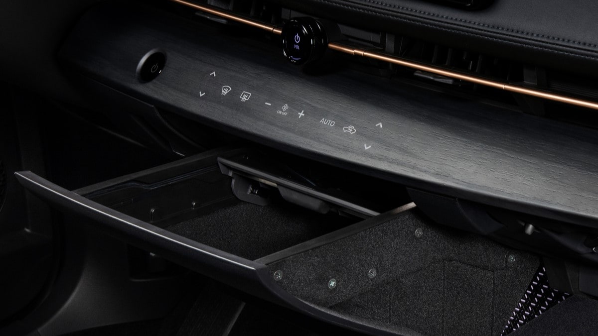 A storage drawer in the dashboard of the 2023 Nissan Ariya