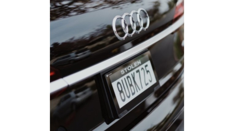 A Reviver digital license plate displaying a 