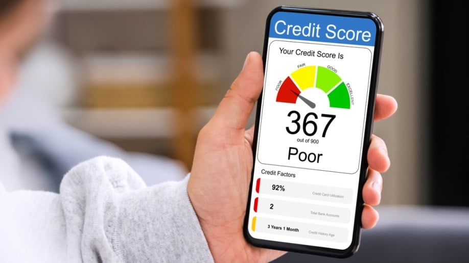 Person looking at poor credit score on mobile phone