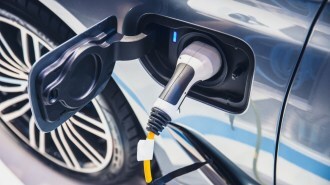 A charging cable connected to an electric car