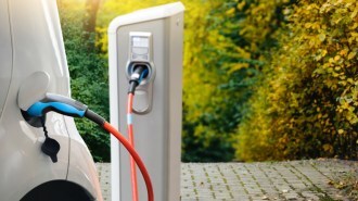 An EV plugged in to charge
