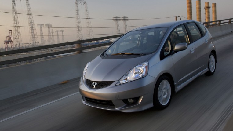 2011 Honda Fit in silver.