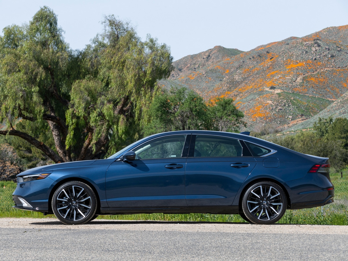 Blue 2023 Honda Accord Hybrid in near hills.