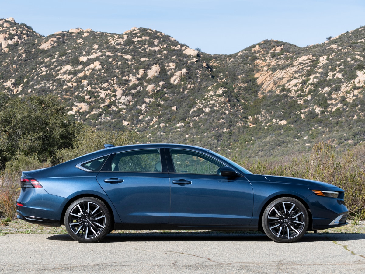 Blue 2023 Honda Accord Hybrid in near hills.