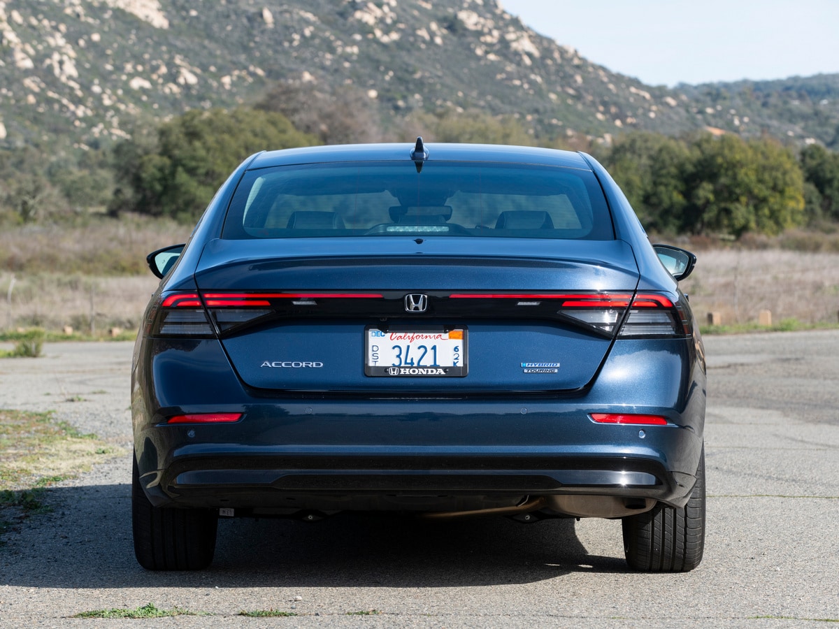 Blue 2023 Honda Accord Hybrid in near hills.