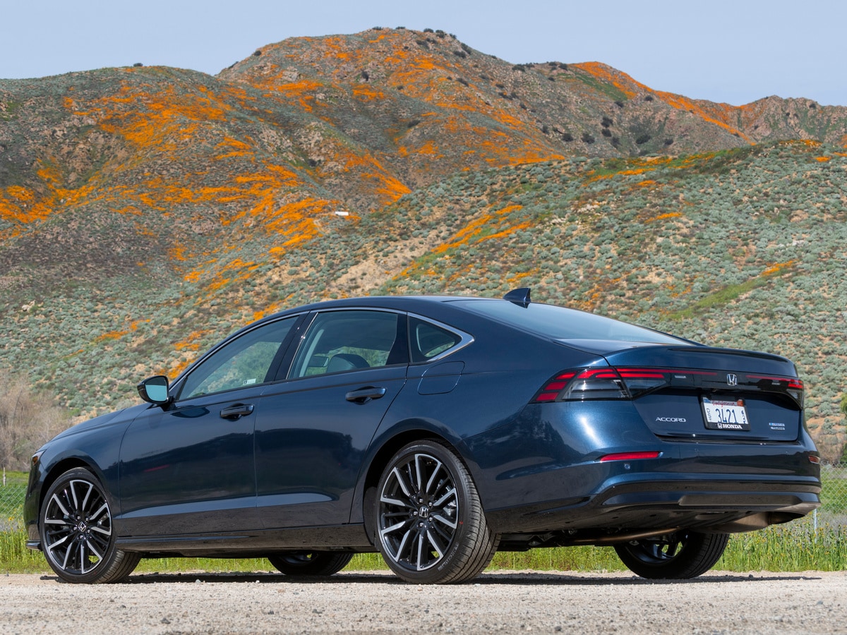 Blue 2023 Honda Accord Hybrid in near hills.
