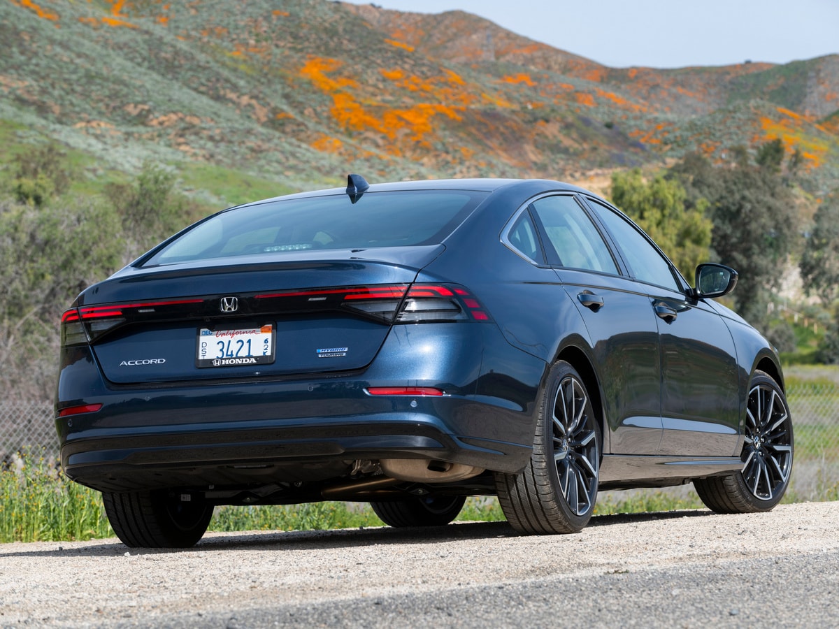 Blue 2023 Honda Accord Hybrid in near hills.